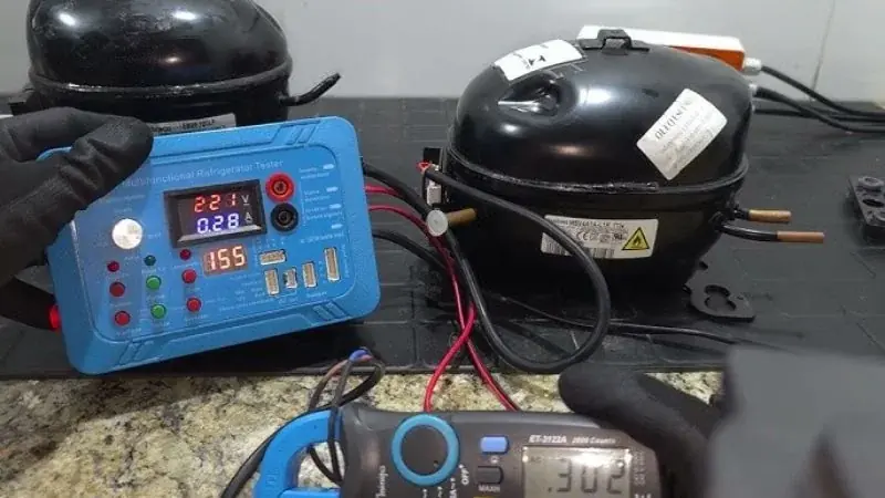 Teste elétrico profissional em compressor de geladeira